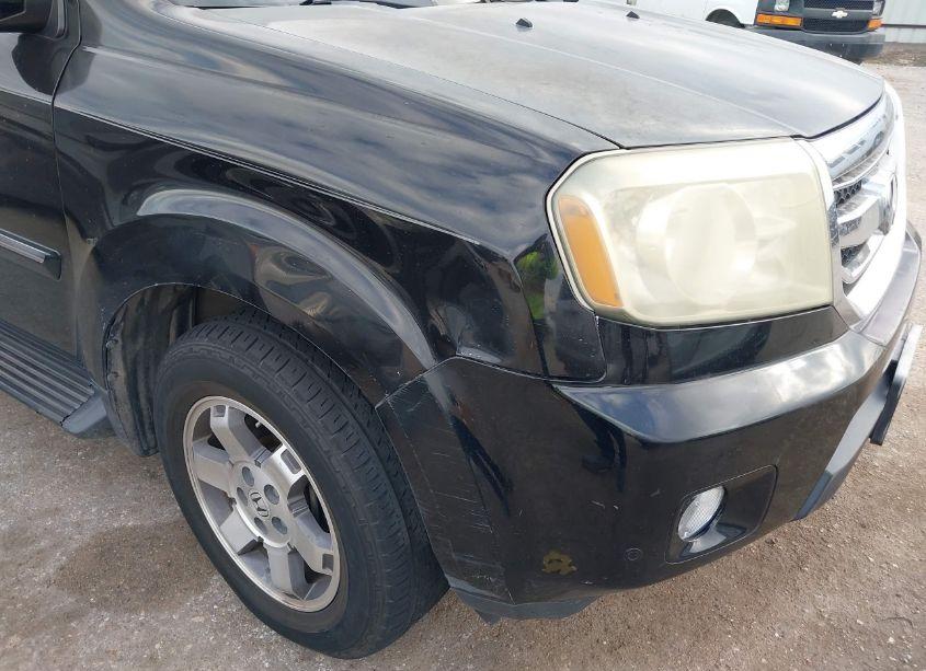 Photo 6 of 2011 Honda Pilot TOURING (VIN 5FNYF4H9XBB075840)