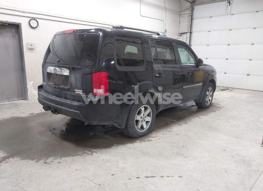 Photo 4 of 2011 Honda Pilot TOURING (VIN 5FNYF4H9XBB089379)