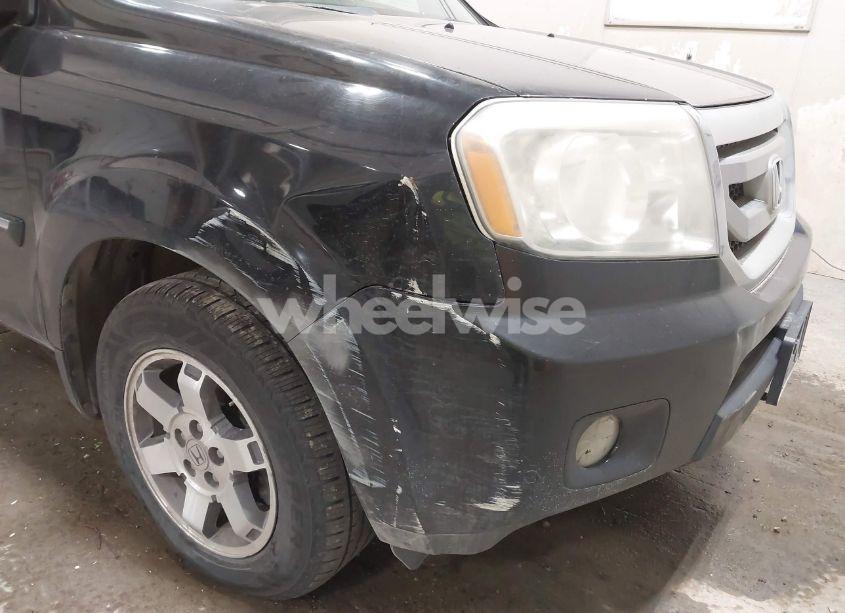 Photo 6 of 2011 Honda Pilot TOURING (VIN 5FNYF4H9XBB089379)