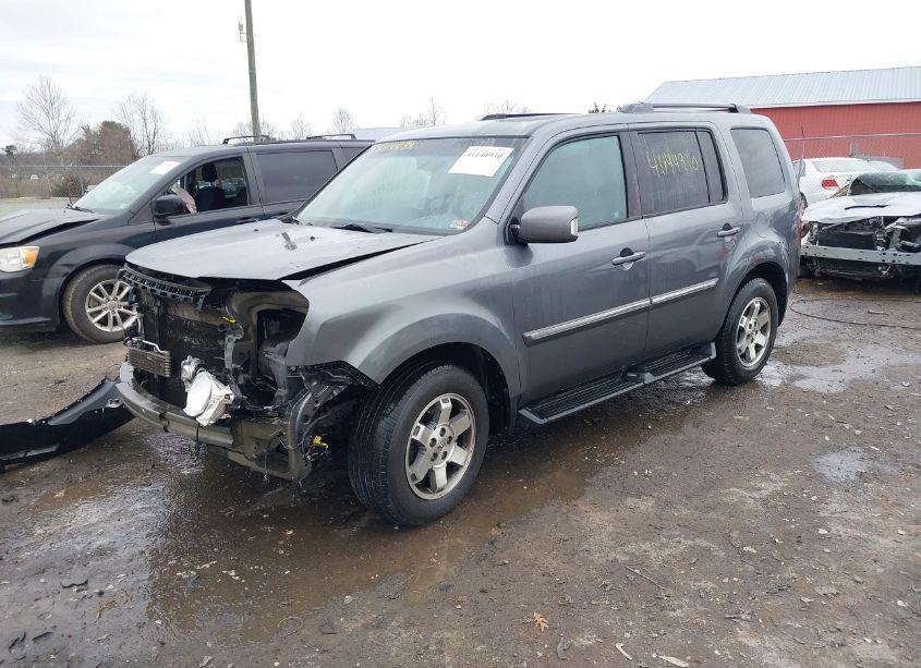 Photo 2 of 2011 Honda Pilot TOURING (VIN 5FNYF4H9XBB090905)