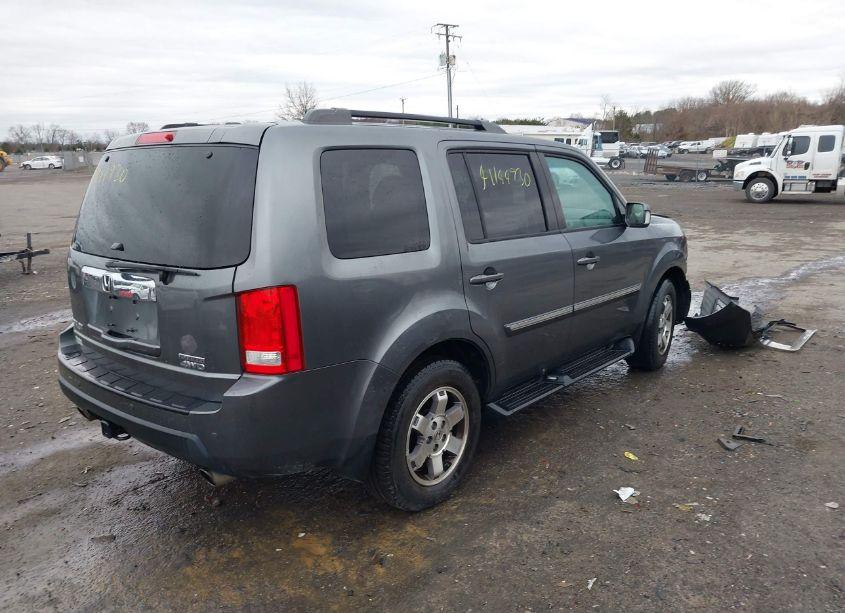 Photo 4 of 2011 Honda Pilot TOURING (VIN 5FNYF4H9XBB090905)