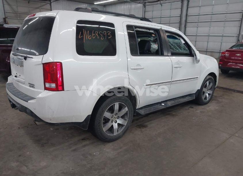 Photo 4 of 2012 Honda Pilot TOURING (VIN 5FNYF4H9XCB035551)