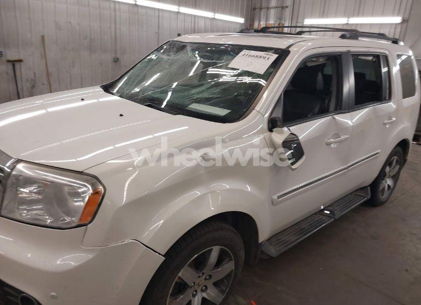 Photo 6 of 2012 Honda Pilot TOURING (VIN 5FNYF4H9XCB035551)