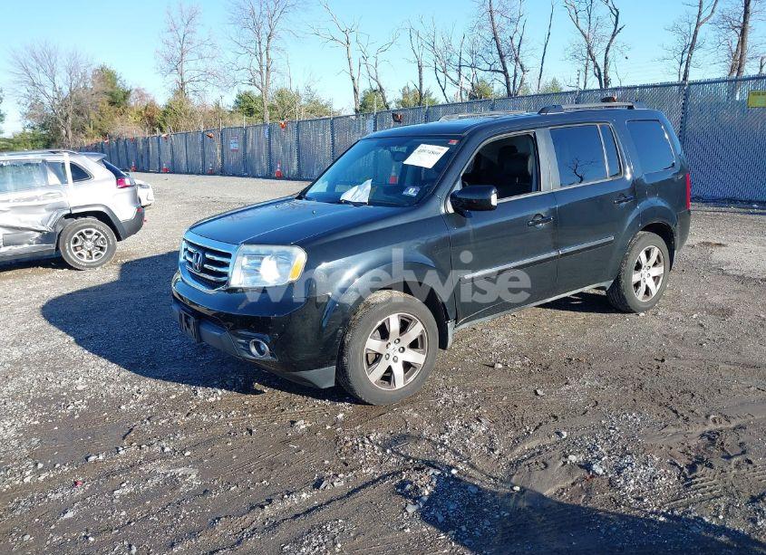 Photo 2 of 2013 Honda Pilot TOURING (VIN 5FNYF4H9XDB019139)