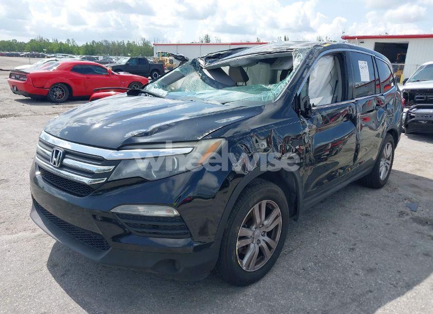 Photo 2 of 2016 Honda Pilot LX (VIN 5FNYF5H10GB040344)