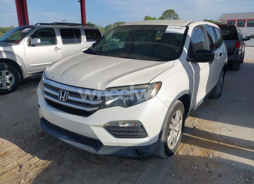 Photo 2 of 2016 Honda Pilot LX (VIN 5FNYF5H12GB012271)
