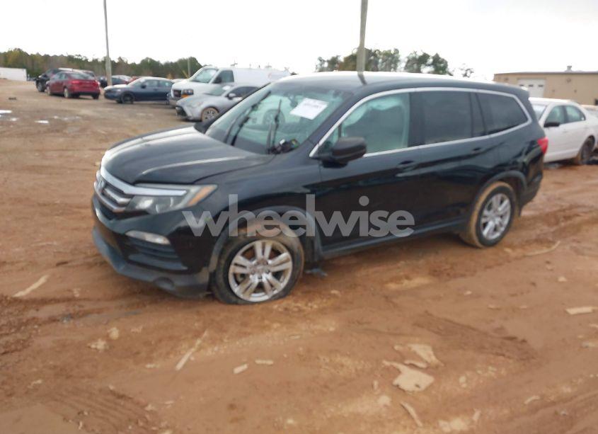 Photo 2 of 2018 Honda Pilot LX (VIN 5FNYF5H13JB022105)