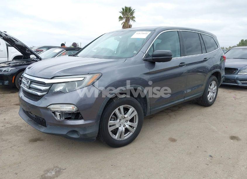 Photo 2 of 2016 Honda Pilot LX (VIN 5FNYF5H14GB037205)