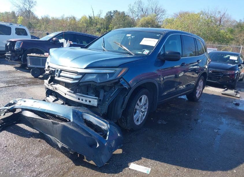 Photo 2 of 2016 Honda Pilot LX (VIN 5FNYF5H1XGB028654)