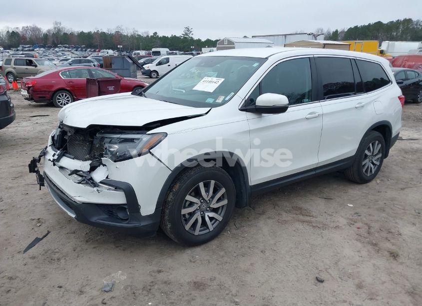 Photo 2 of 2021 Honda Pilot 2WD EX (VIN 5FNYF5H39MB035866)