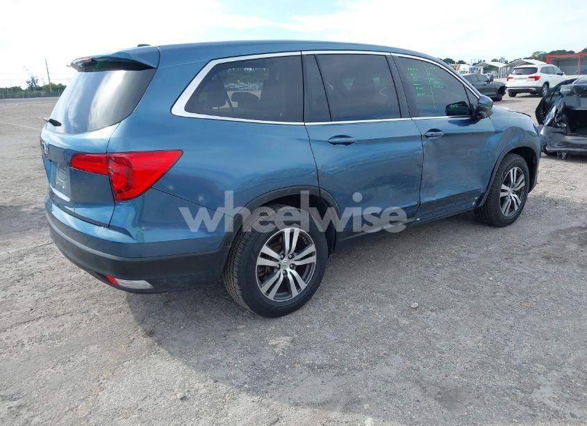 Photo 4 of 2016 Honda Pilot EX-L (VIN 5FNYF5H50GB004883)