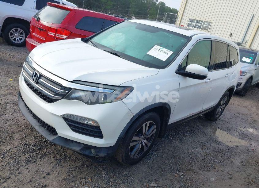 Photo 2 of 2017 Honda Pilot EX-L (VIN 5FNYF5H50HB025220)