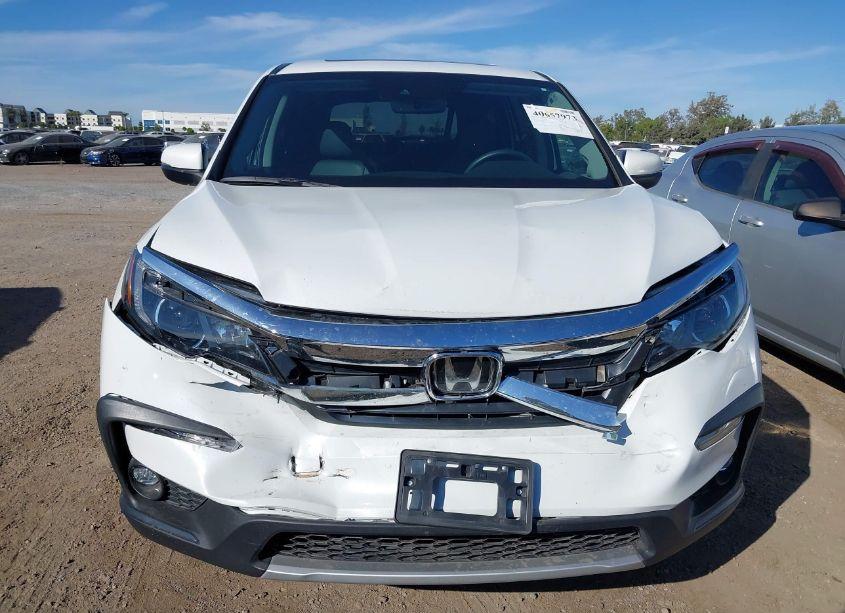 Photo 6 of 2022 Honda Pilot 2WD EX-L (VIN 5FNYF5H50NB016173)