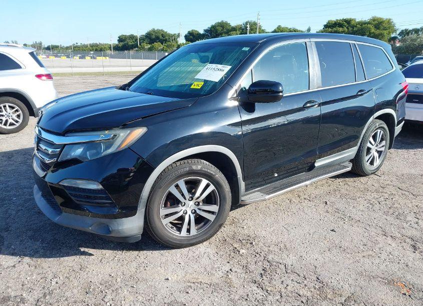 Photo 2 of 2016 Honda Pilot EX-L (VIN 5FNYF5H51GB025161)