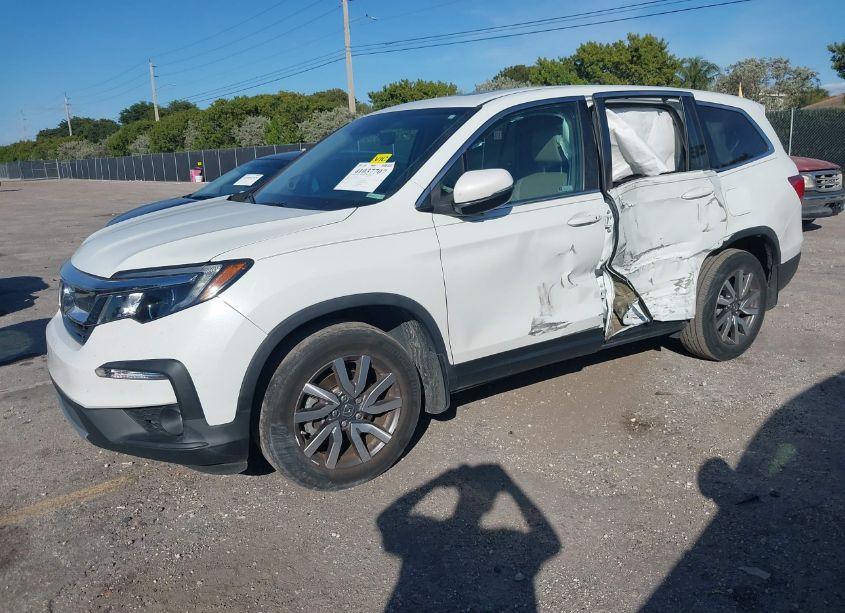 Photo 2 of 2021 Honda Pilot 2WD EX-L (VIN 5FNYF5H51MB041873)