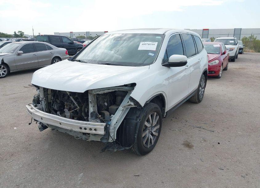 Photo 2 of 2021 Honda Pilot 2WD EX-L (VIN 5FNYF5H52MB012835)