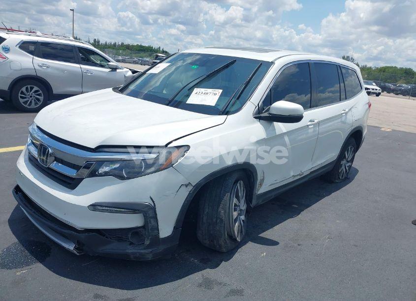 Photo 2 of 2021 Honda Pilot 2WD EX-L (VIN 5FNYF5H52MB039338)