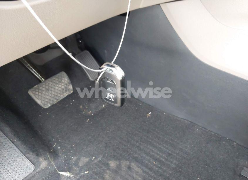 Photo 11 of 2022 Honda Pilot 2WD EX-L (VIN 5FNYF5H52NB003232)