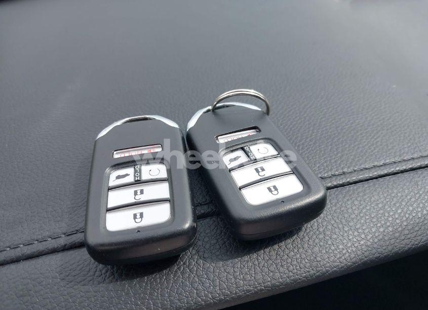 Photo 11 of 2022 Honda Pilot 2WD EX-L (VIN 5FNYF5H53NB006219)