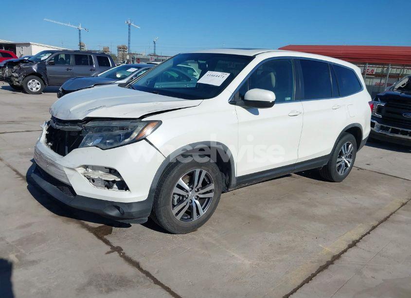 Photo 2 of 2017 Honda Pilot EX-L (VIN 5FNYF5H54HB043638)