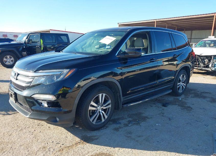 Photo 2 of 2016 Honda Pilot EX-L (VIN 5FNYF5H55GB027298)