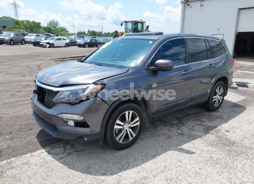 Photo 2 of 2017 Honda Pilot EX-L (VIN 5FNYF5H55HB013029)