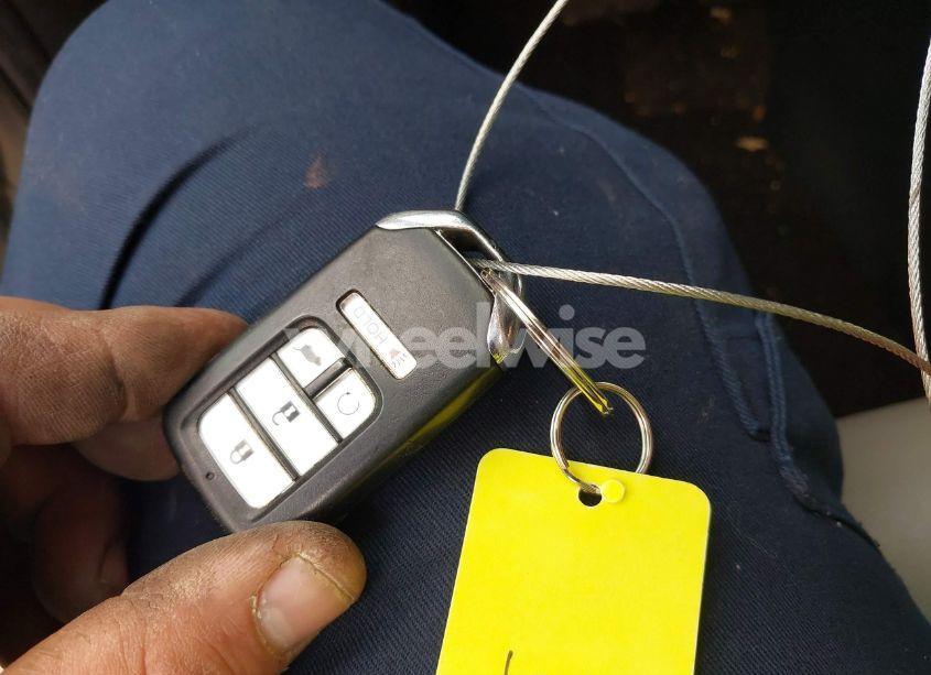 Photo 11 of 2022 Honda Pilot 2WD EX-L (VIN 5FNYF5H55NB000986)