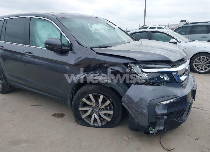 Photo 6 of 2022 Honda Pilot 2WD EX-L (VIN 5FNYF5H55NB000986)