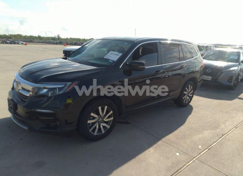 Photo 2 of 2022 Honda Pilot 2WD EX-L (VIN 5FNYF5H55NB003547)