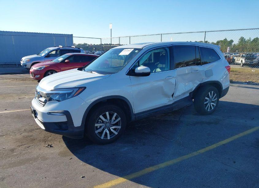 Photo 2 of 2022 Honda Pilot 2WD EX-L (VIN 5FNYF5H55NB009641)