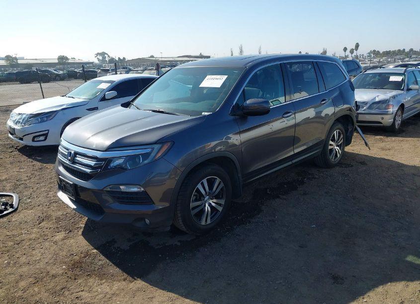 Photo 2 of 2018 Honda Pilot EX-L (VIN 5FNYF5H56JB010937)
