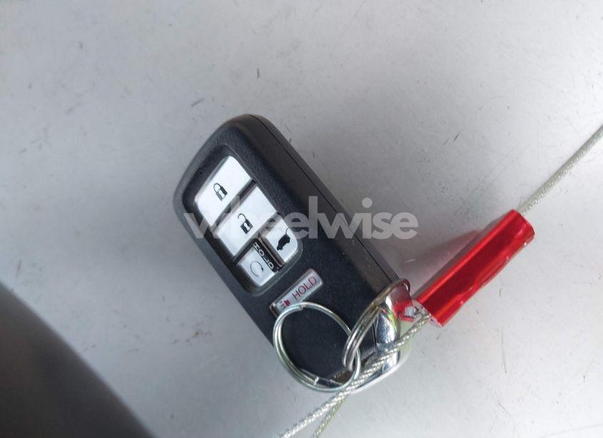 Photo 11 of 2021 Honda Pilot 2WD EX-L (VIN 5FNYF5H56MB011624)