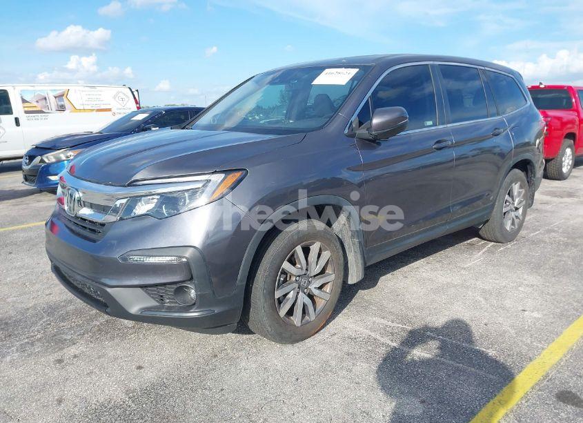 Photo 2 of 2021 Honda Pilot 2WD EX-L (VIN 5FNYF5H56MB011624)