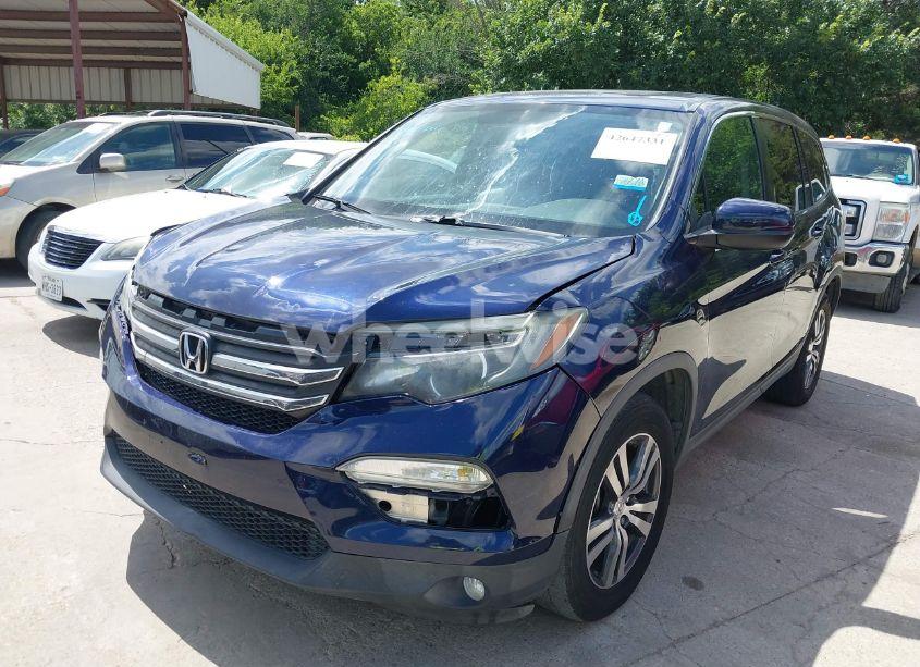 Photo 2 of 2017 Honda Pilot EX-L (VIN 5FNYF5H57HB025053)