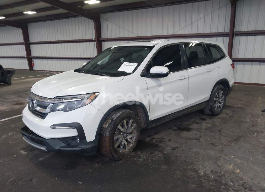Photo 2 of 2021 Honda Pilot 2WD EX-L (VIN 5FNYF5H57MB022843)