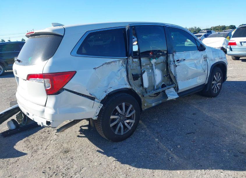 Photo 4 of 2022 Honda Pilot 2WD EX-L (VIN 5FNYF5H5XNB016293)