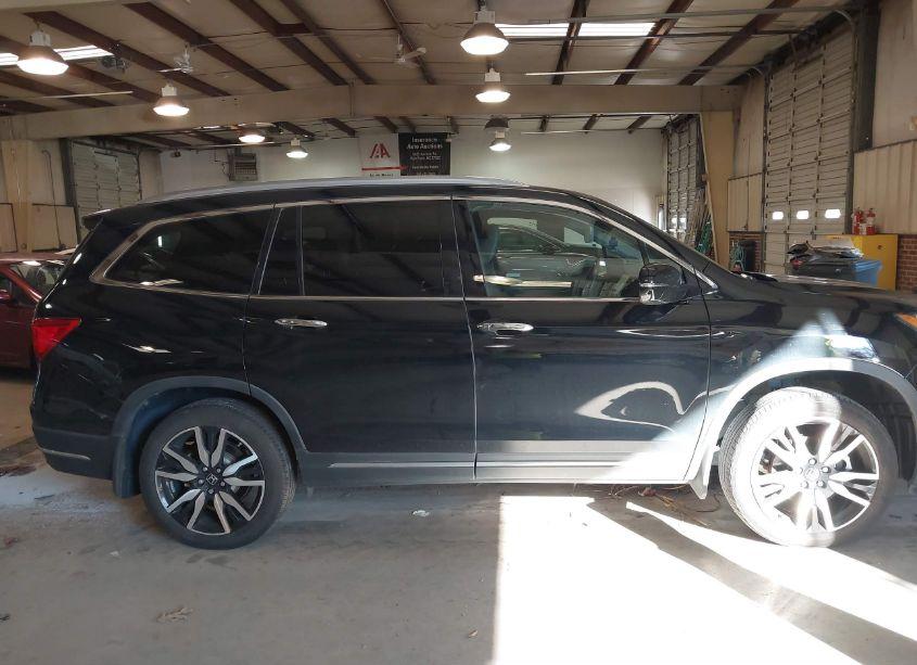 Photo 14 of 2022 Honda Pilot 2WD TOURING 7 PASSENGER (VIN 5FNYF5H60NB013377)