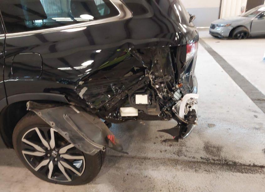 Photo 6 of 2022 Honda Pilot 2WD TOURING 7 PASSENGER (VIN 5FNYF5H60NB013377)