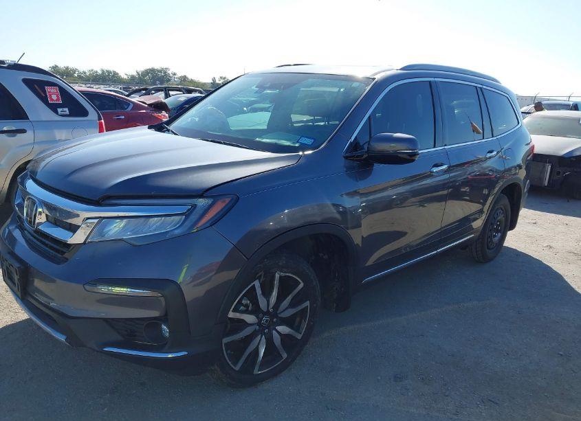 Photo 2 of 2022 Honda Pilot 2WD TOURING 7 PASSENGER (VIN 5FNYF5H61NB031922)