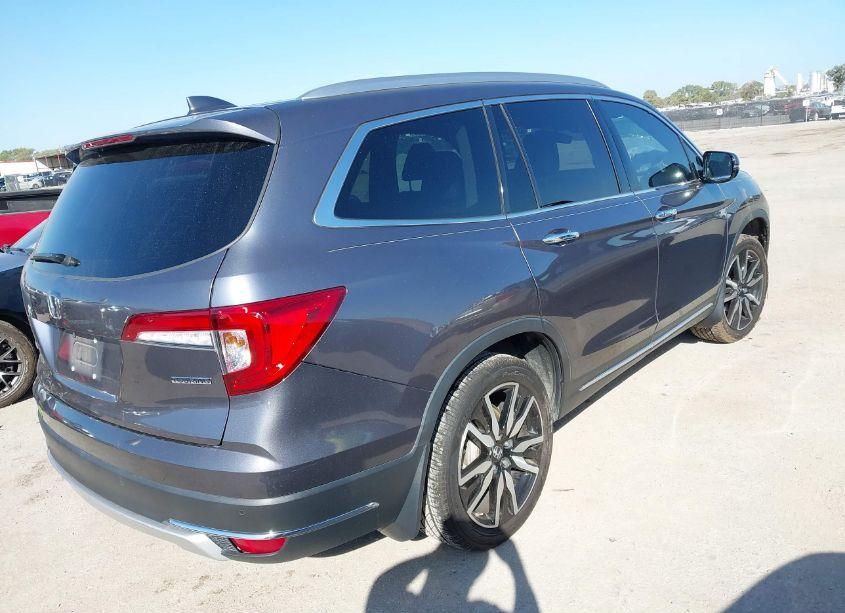 Photo 4 of 2022 Honda Pilot 2WD TOURING 7 PASSENGER (VIN 5FNYF5H61NB031922)