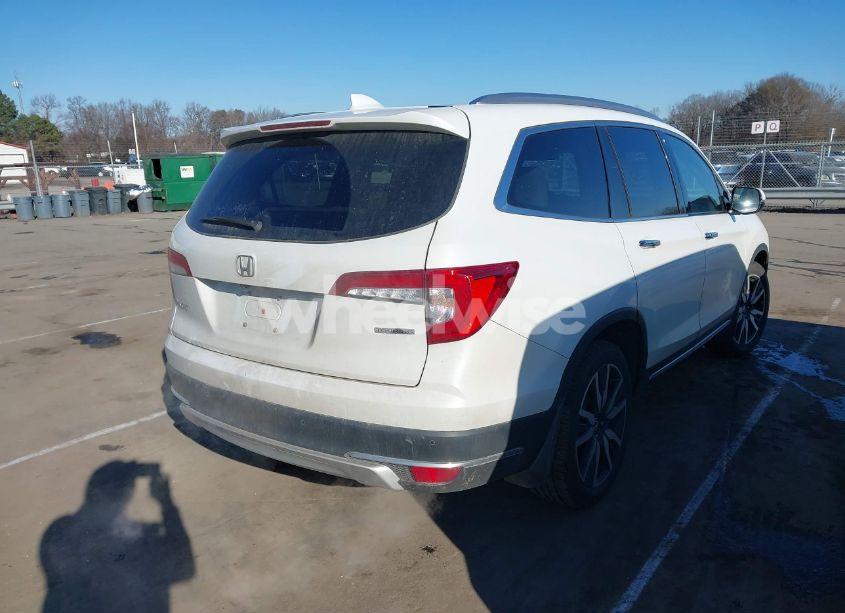 Photo 4 of 2021 Honda Pilot 2WD TOURING 7 PASSENGER (VIN 5FNYF5H64MB031671)