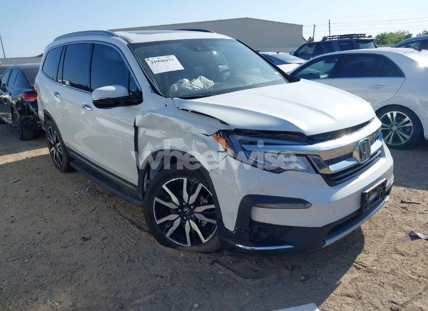 2022 Honda Pilot 2WD TOURING 7 PASSENGER (VIN 5FNYF5H64NB027301) main photo