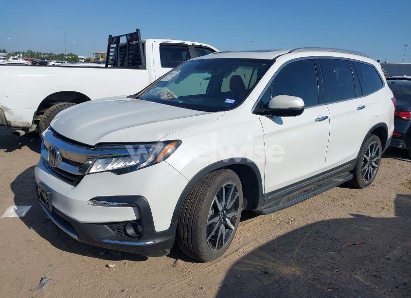 Photo 2 of 2022 Honda Pilot 2WD TOURING 7 PASSENGER (VIN 5FNYF5H64NB027301)