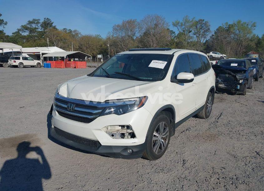 Photo 2 of 2017 Honda Pilot EX-L (VIN 5FNYF5H65HB034987)