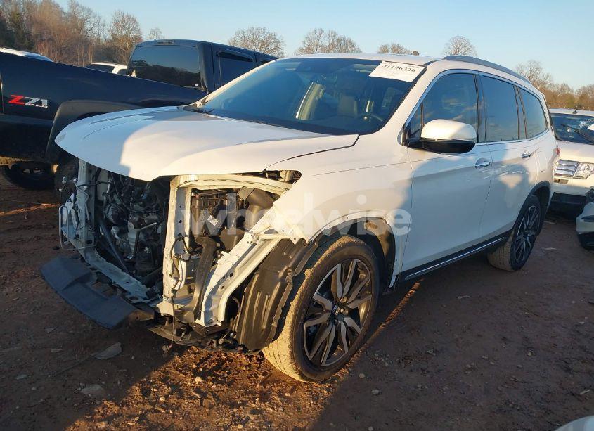 Photo 2 of 2021 Honda Pilot 2WD TOURING 7 PASSENGER (VIN 5FNYF5H65MB025717)