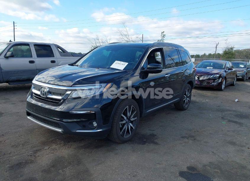 Photo 2 of 2021 Honda Pilot 2WD TOURING 7 PASSENGER (VIN 5FNYF5H68MB000651)