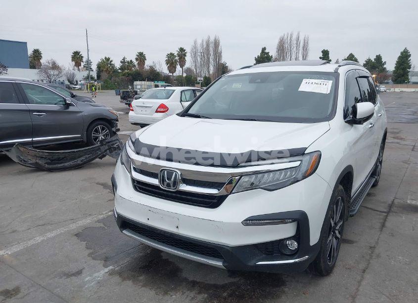 Photo 6 of 2021 Honda Pilot 2WD TOURING 7 PASSENGER (VIN 5FNYF5H68MB001296)