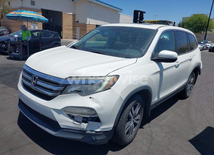 Photo 2 of 2017 Honda Pilot EX-L (VIN 5FNYF5H80HB040102)