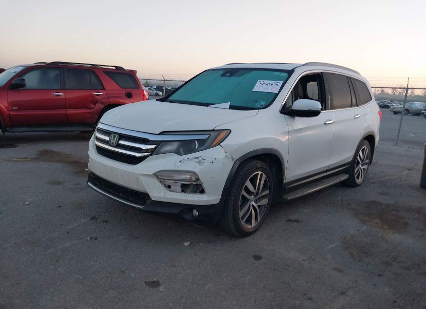 Photo 2 of 2016 Honda Pilot TOURING (VIN 5FNYF5H90GB038552)