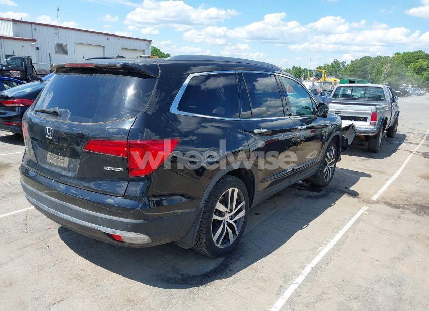 Photo 4 of 2017 Honda Pilot TOURING (VIN 5FNYF5H91HB038268)